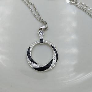 SHB Silver Tone Black Crystal Circle Necklace